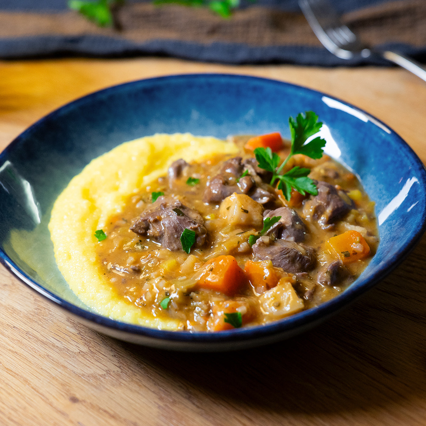 Coq au vin mit Polenta