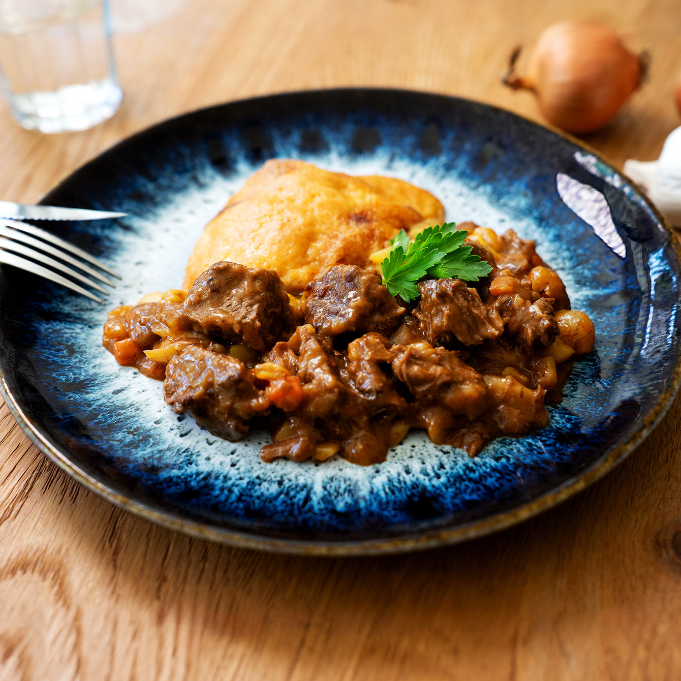Rindsragout mit Kartoffelgratin