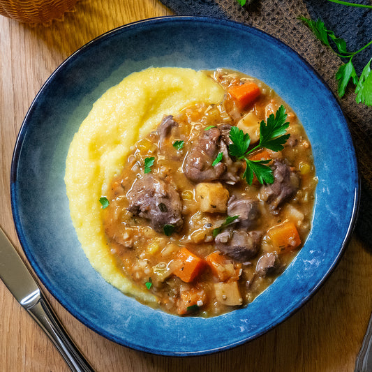 Coq au vin mit Bramata- Polenta