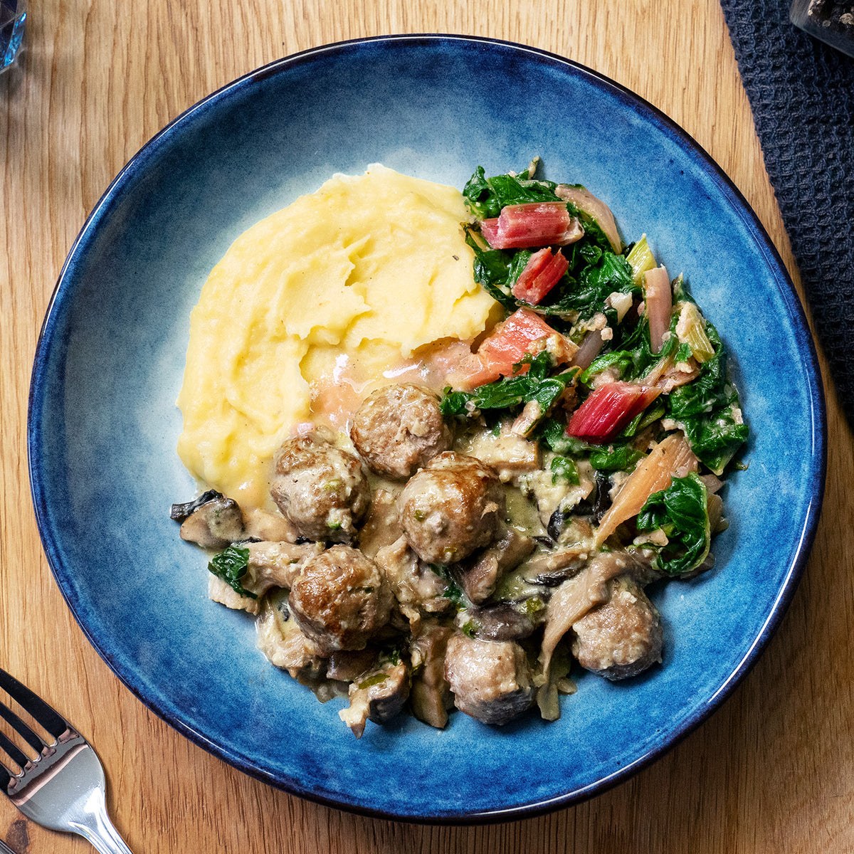 Meatballs mit Mangold und Härdöpfelstock